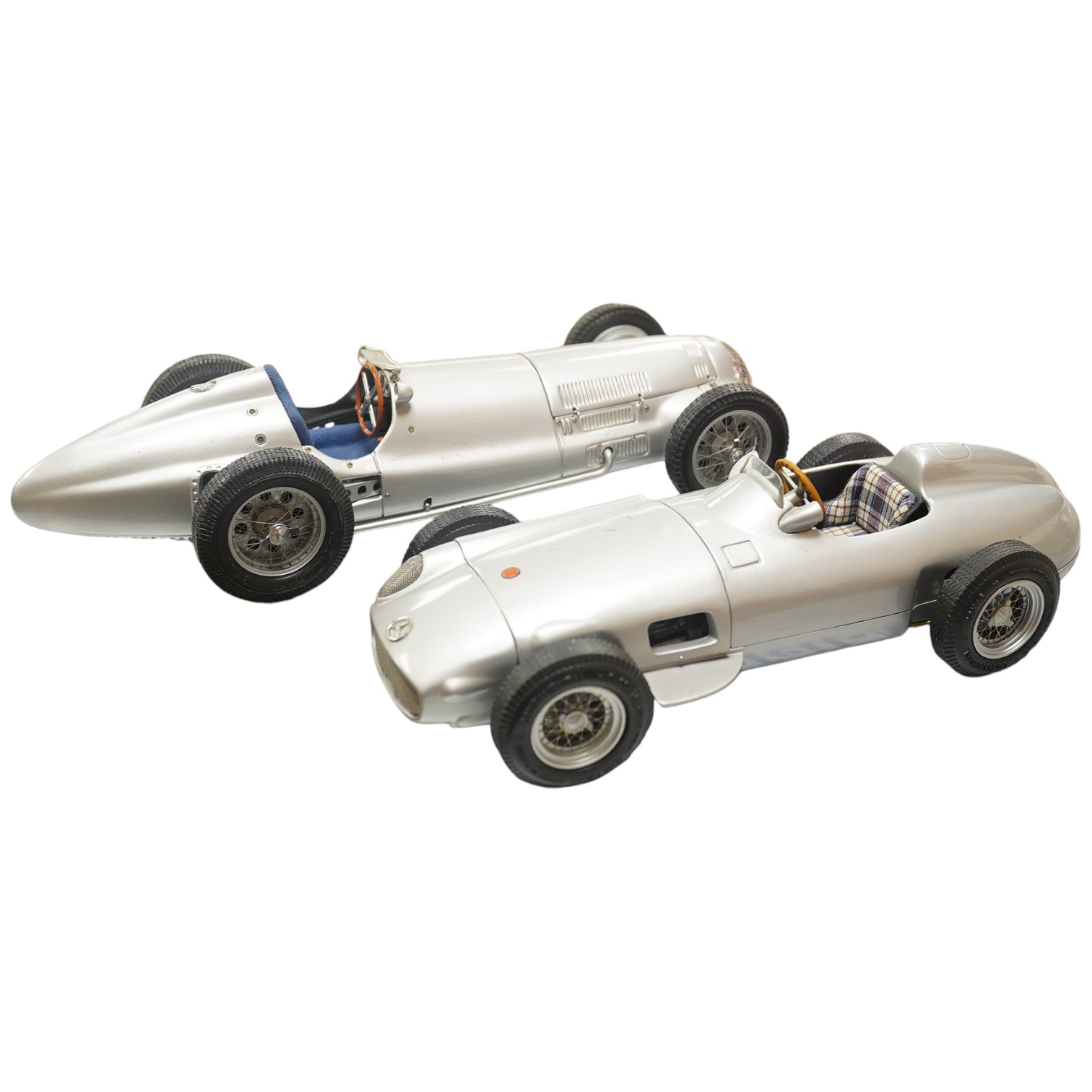 Two boxed CMC 1:18 scale diecast model cars; a Mercedes-Benz W196, together with a Mercedes-Benz W154 1938. Condition - fair to good, and slight metal fatiguing to the bonnet on the W196 as occasionally found with early